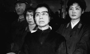 Jiang Qing, the widow of Chinese leader Mao Tse-tung, stands handcuffed in the Supreme People's Court in Beijing, China during the Gang of Four Trial in January of 1981. Jiang, a former actress, was sentenced to death for her role in China's failed Cultural Revolution; her sentence was suspended so that she might "reform through labor." (AP Photo/Xinhua)